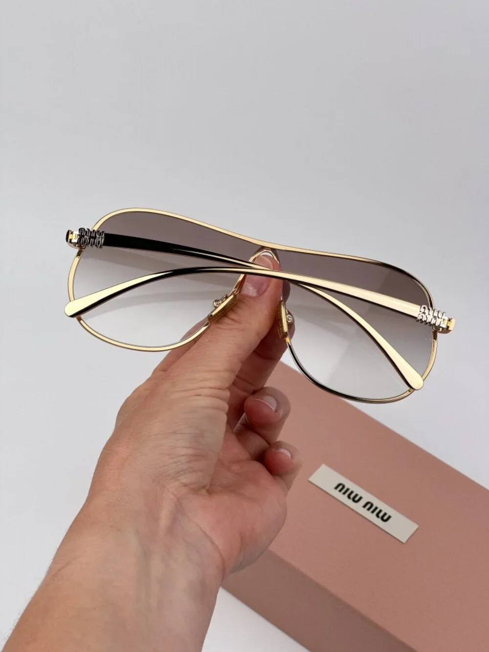 Miu Miu MUA56S 5AK90L Sunglasses – Shiny Gold Pilot Metal Frame Brown Gradient